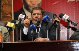 مرسي والشهداء.jpg
